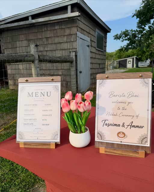 Menu and welcome signs for a nikah ceremony with tulips